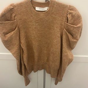 Puff sleeve sweater. Poly wool blend.
